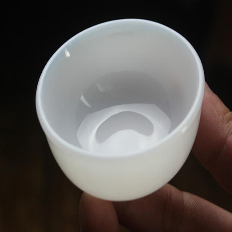 德化羊脂白玉瓷品茶杯手工陶瓷品茗杯白瓷功夫茶具普洱杯主人杯垫