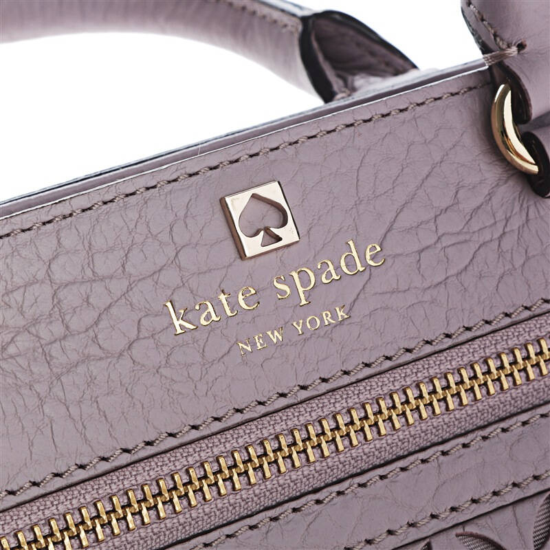 kate spade 凯特·丝蓓 女士浅紫色镂空花纹时尚单肩包手提包斜挎包