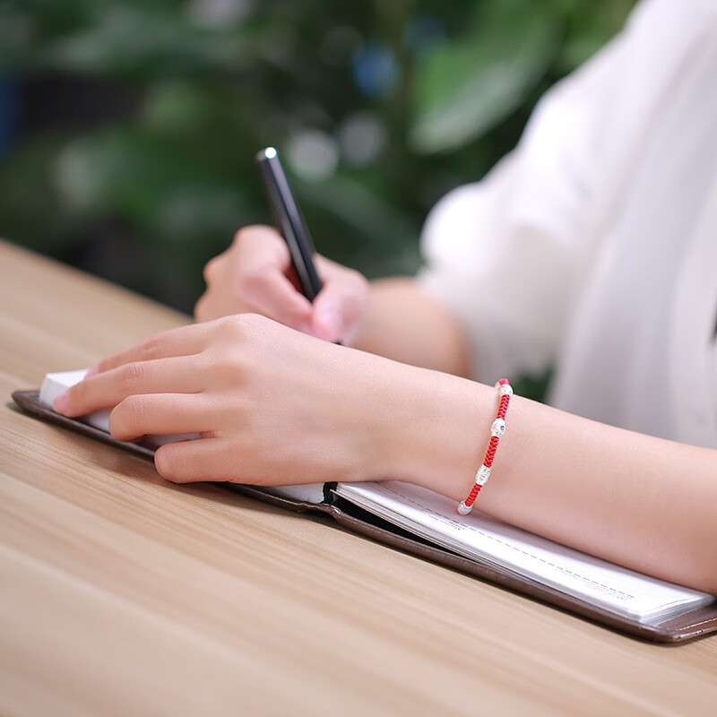 花影足银编织红绳手链