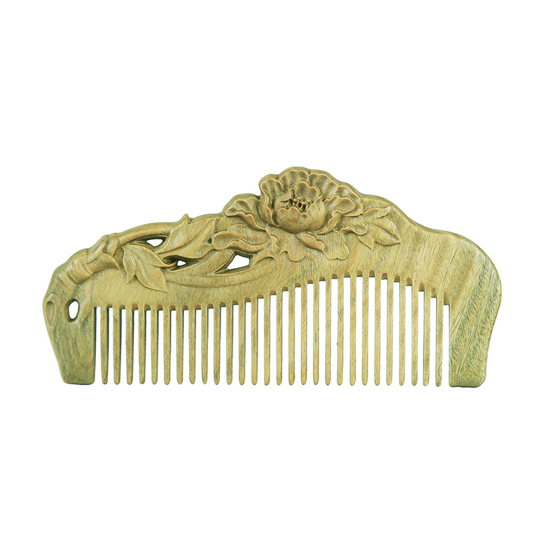 周广胜 牡丹雕花 梳子