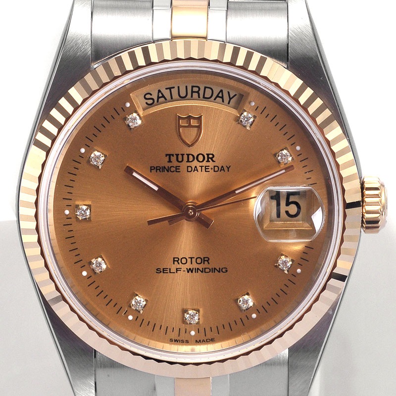 帝舵(tudor)手表 自动机械男表香槟色光面表盘镶钻刻度日期星期双显