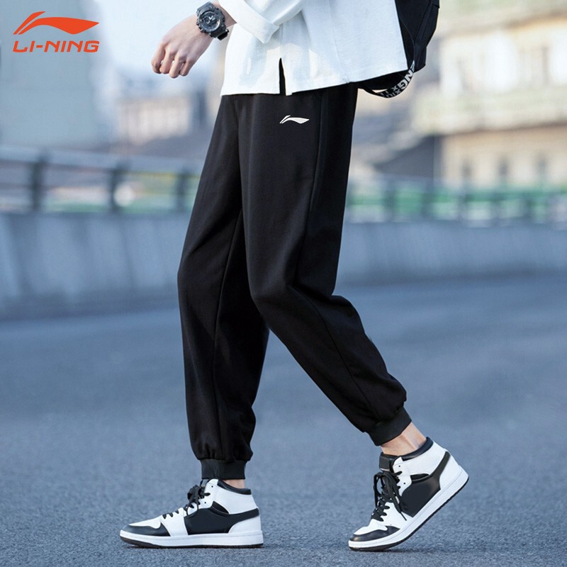 Li Ning sports pants men's pants spring and autumn running leisure long pants men's closed small foot knitted woven pocket zipper pants