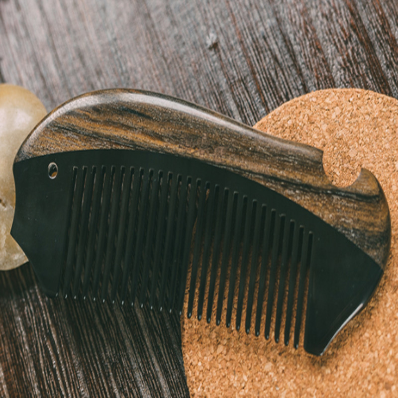 谭木匠送长辈牛角木梳