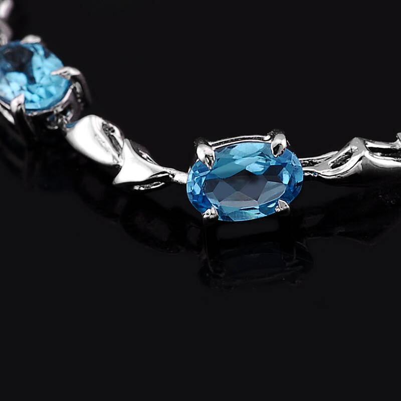 > 易燃火山水晶饰品 淡雅脱俗 925纯银天然蓝黄玉/托帕石手链 女款 送