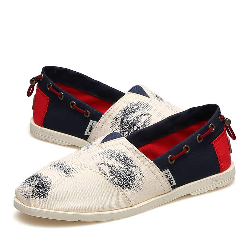 汤姆斯 2015秋新款时尚唇印平底浅口透气女帆布单鞋 tm8462104w 深蓝